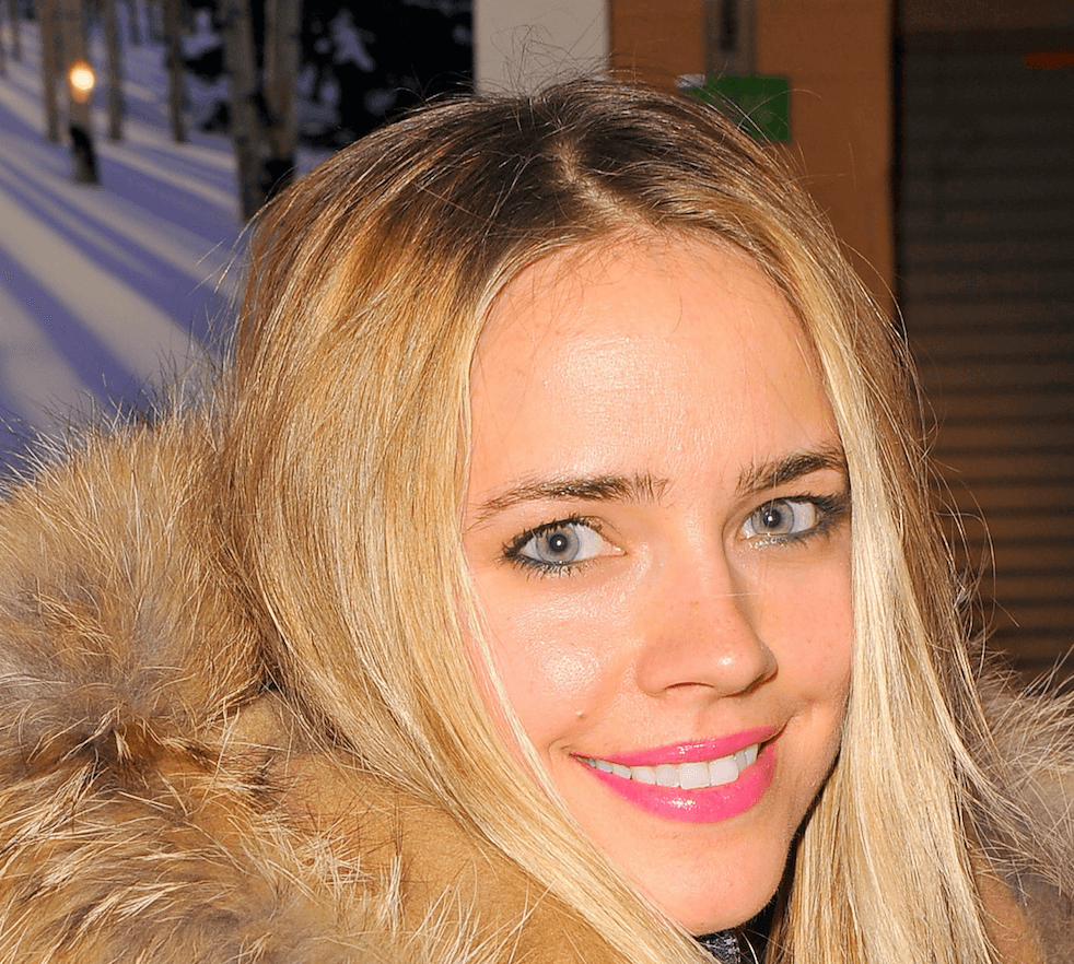 Jessica Barth wearing a fur jacket at a fashion show. Jessica Barth wearing a fur jacket at a fashion show.