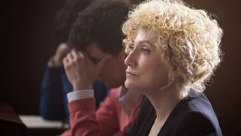 A lawyer sits next to two brothers in Law & Order True Crime: The Menendez Brothers A lawyer sits next to two brothers in Law & Order True Crime: The Menendez Brothers