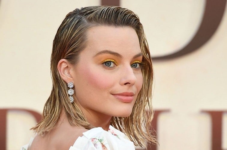 Australian actress Margot Robbie poses upon arrival for the World Premiere of the film, 'Goodbye Christopher Robin' in London on September 20, 2017.