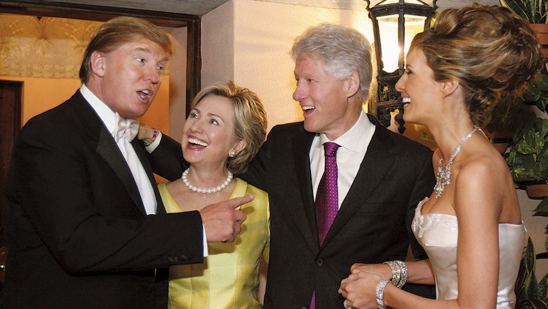 Donald Trump and Melania talking to Hilary Clinton and Bill Clinton on their wedding day.