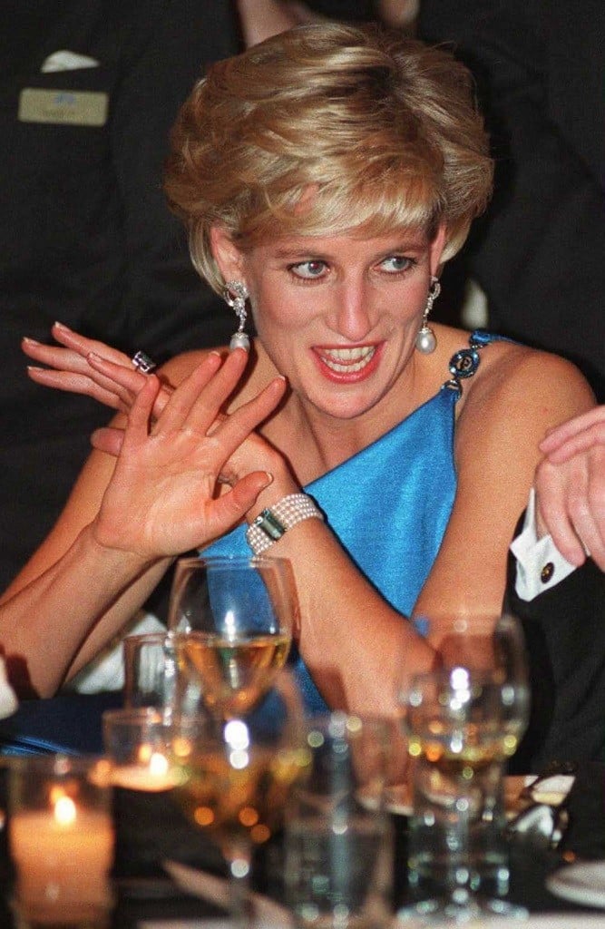 Diana, Princess of Wales, converses during a gala.