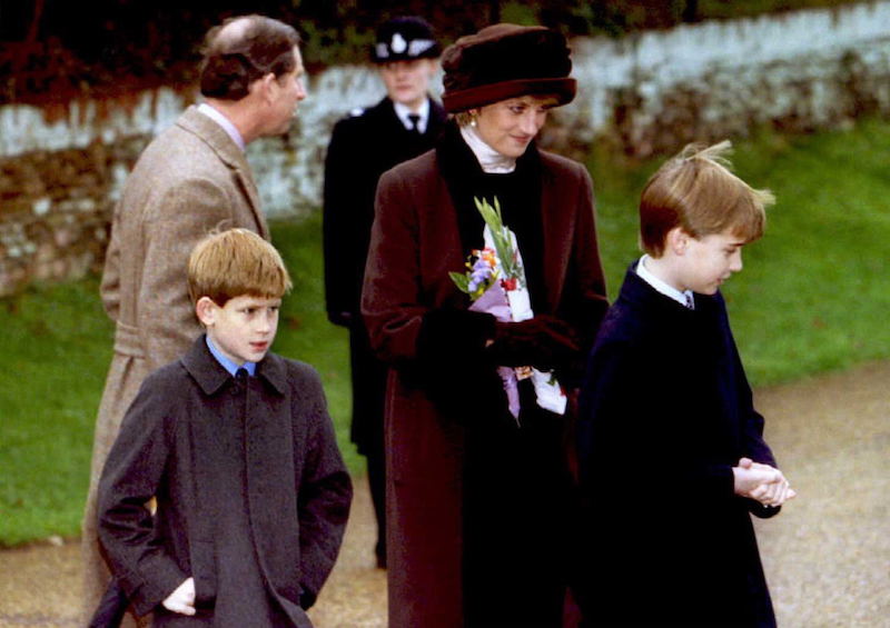 Princess Diana walking with her two sons and husband. Princess Diana walking with her two sons and husband.