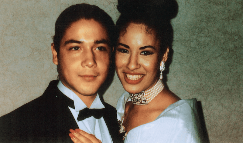 Selena and Chris Perez posing together and smiling. Selena and Chris Perez posing together and smiling.