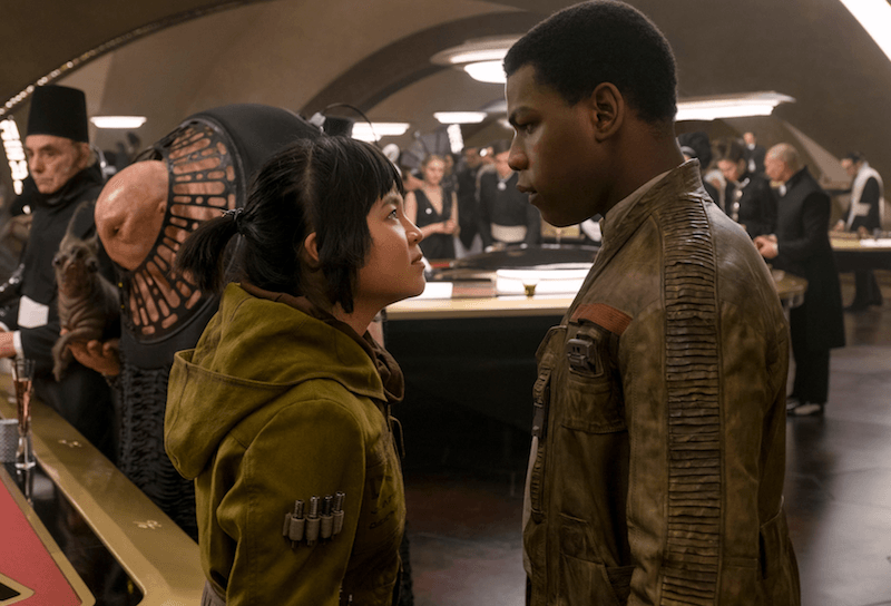 Finn and Rose stand in front of each other while at Canto Bright. Finn and Rose stand in front of each other while at Canto Bright.