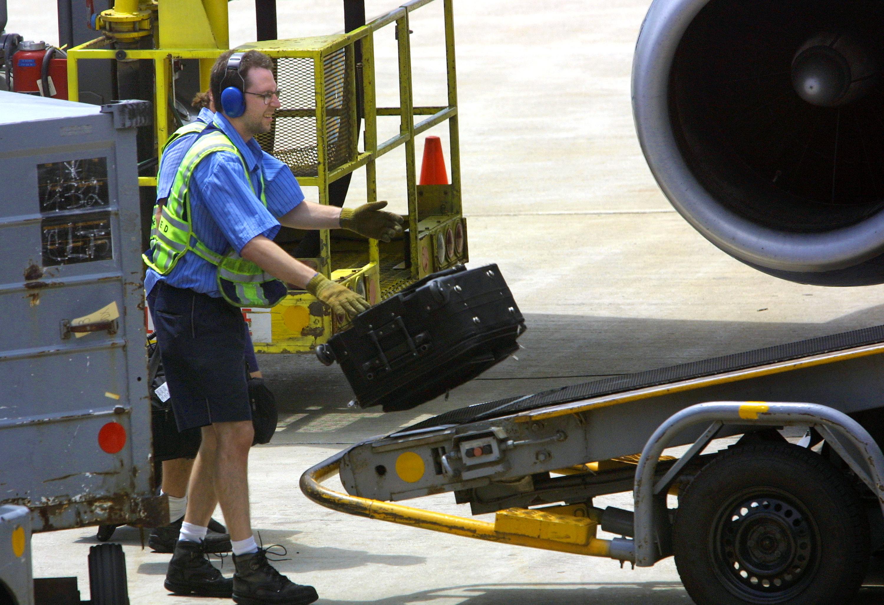 Baggage handler conveyor belt