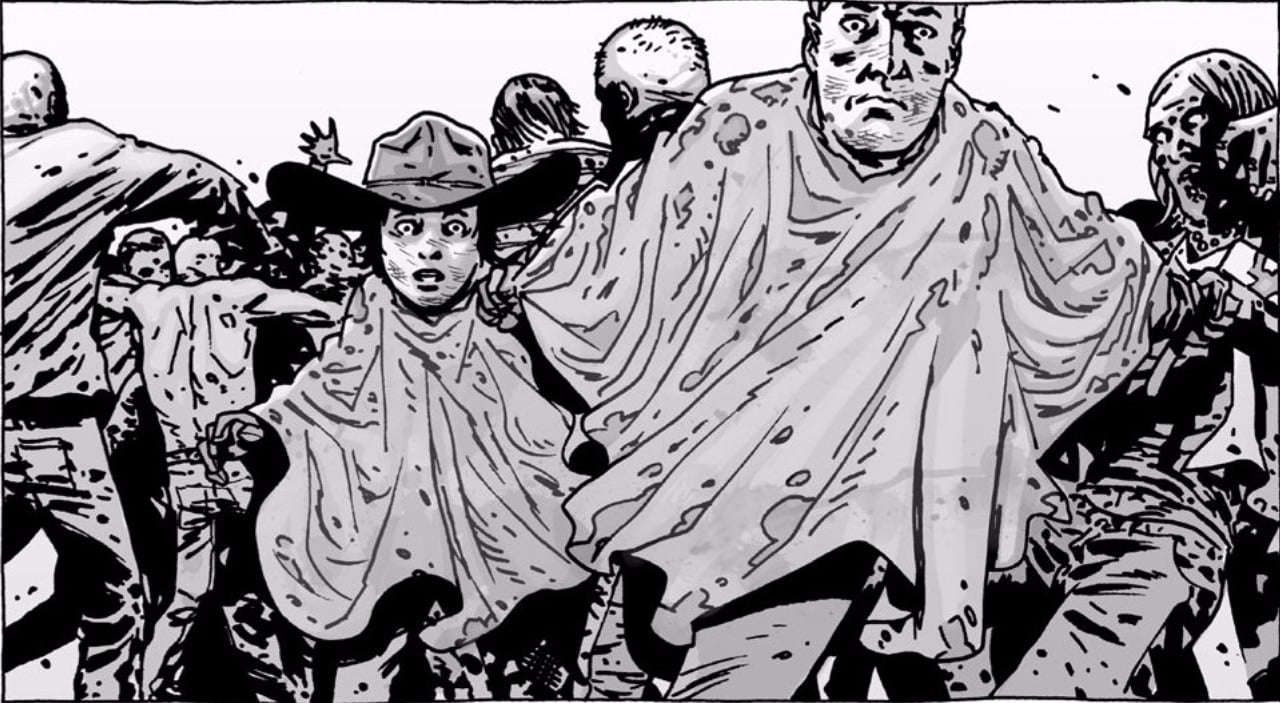 Wearing ponchos, Carl and Rick Grimes try to evade walkers in 'The Walking Dead' comics. 