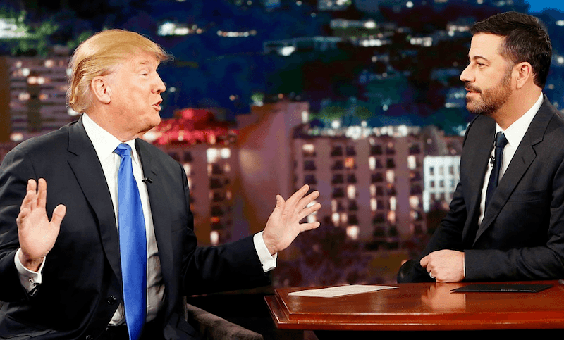 Donald Trump lifts his hands while talking to Jimmy Kimmel 