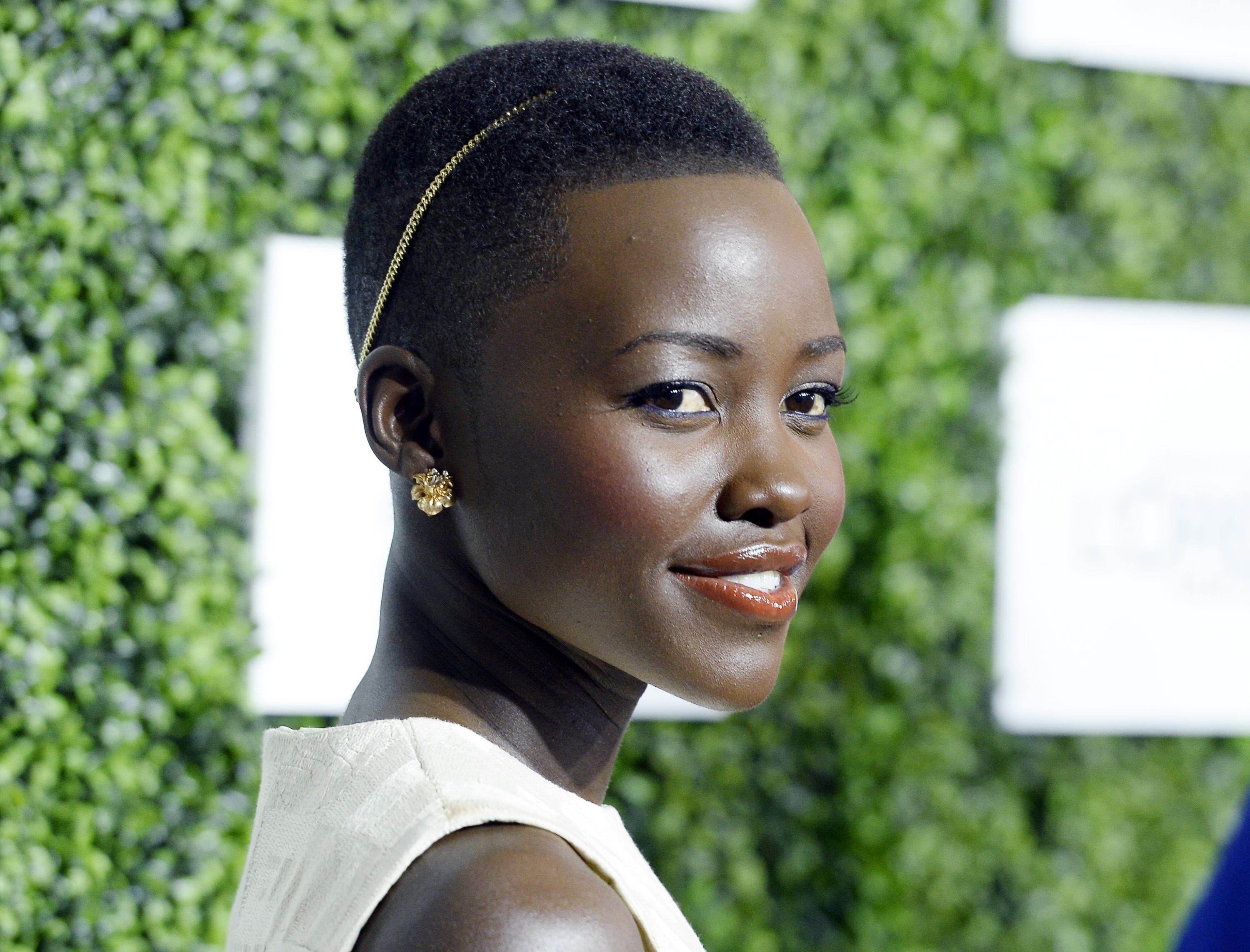 Lupita Nyong'o attends 7th Annual ESSENCE Black Women In Hollywood Luncheon February 27, 2014 in Beverly Hills, California. Lupita Nyong'o attends 7th Annual ESSENCE Black Women In Hollywood Luncheon February 27, 2014 in Beverly Hills, California.