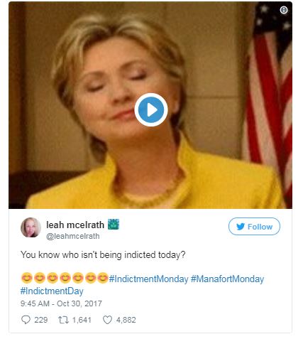 a tweet with a gif of Hillary Clinton in a yellow suit a tweet with a gif of Hillary Clinton in a yellow suit