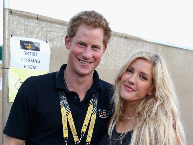 Prince Harry and Ellie Goulding smile and pose next to each other