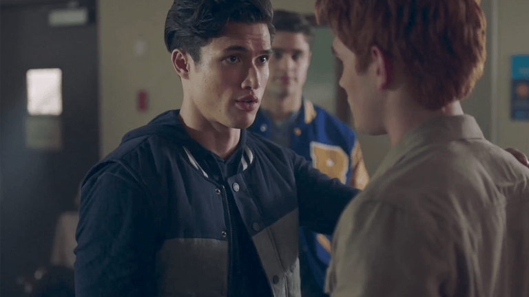 Reggie looks at Archie in Riverdale Season 2 Reggie looks at Archie in Riverdale Season 2