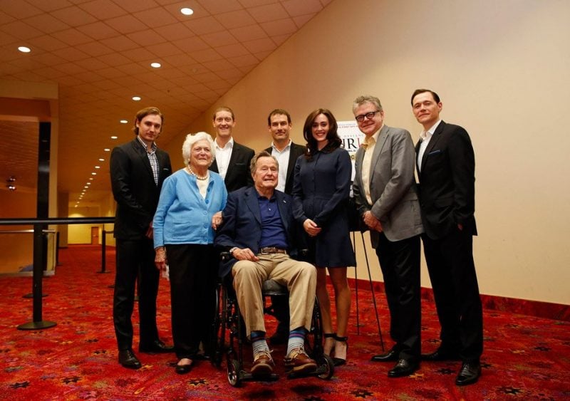 Heather Lind and the rest of the team behind Turn: Washington's Spies take a photo with George H.W. Bush