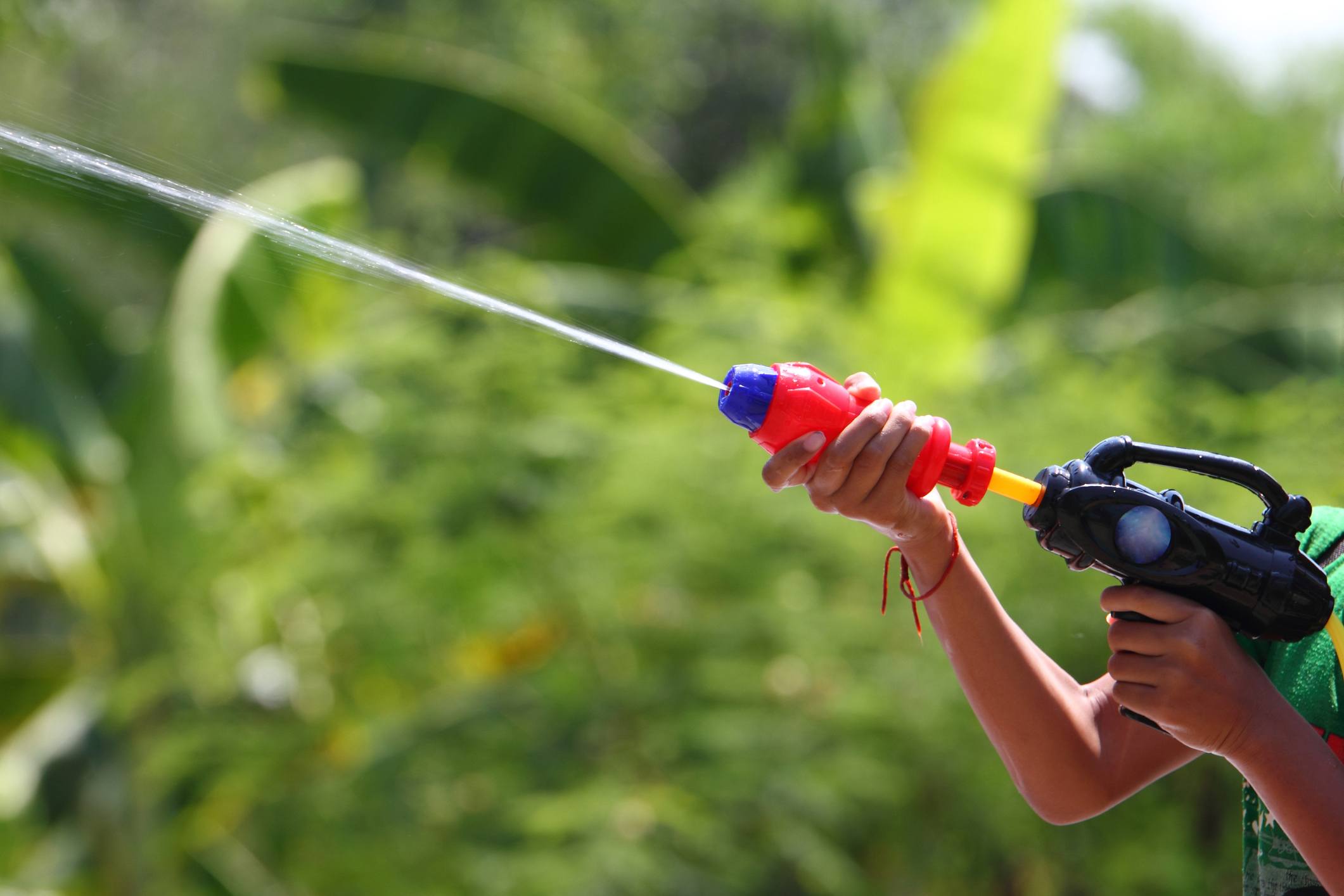 Child with water gun