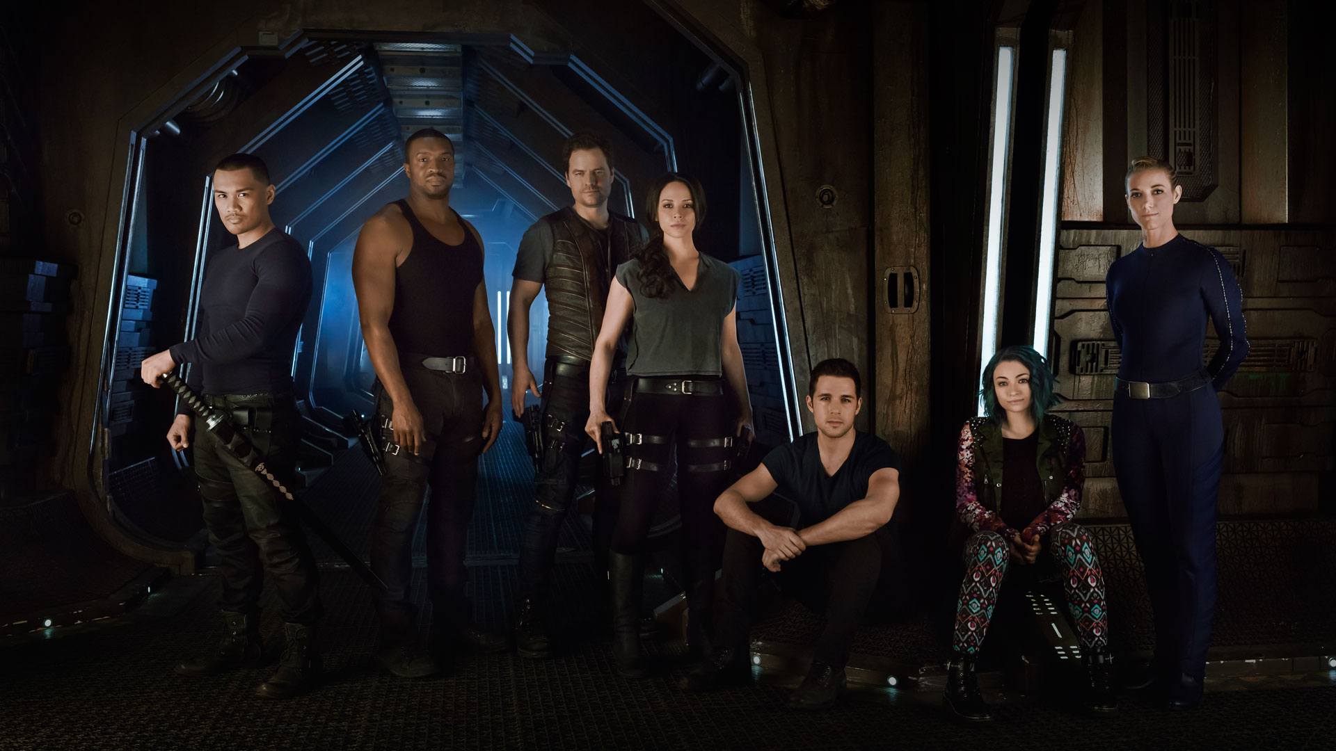 A group of people stand next to each other A group of people stand next to each other