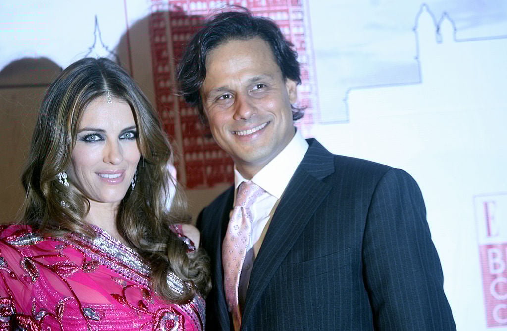 Elizabeth Hurley and Arun Nayar British model and actress Elizabeth Hurley (L) and her husband, Indian businessman Arun Nayar