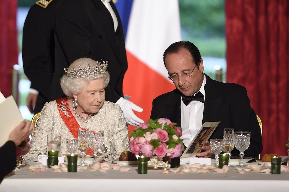 Britain's Queen Elizabeth and French President Francois Hollande attend a state dinner at the Elysee presidential palace in Paris