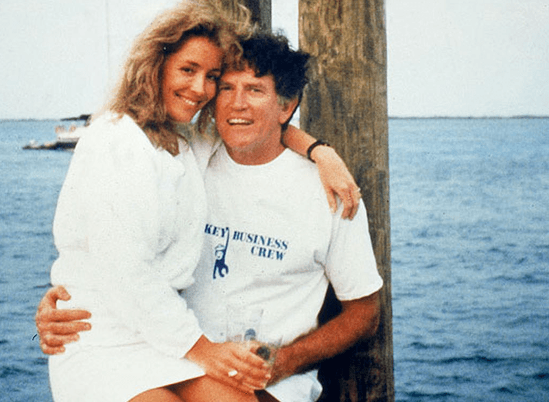 Gary Hart and Donna Rice sit on a yacht.