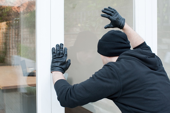 Burglar looking through window