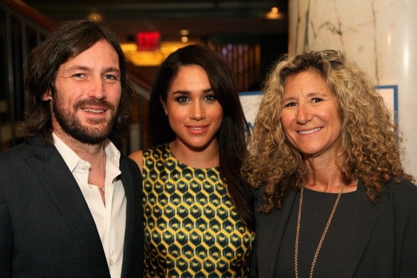 meghan markle (center) with friends at a charity event meghan markle (center) with friends at a charity event