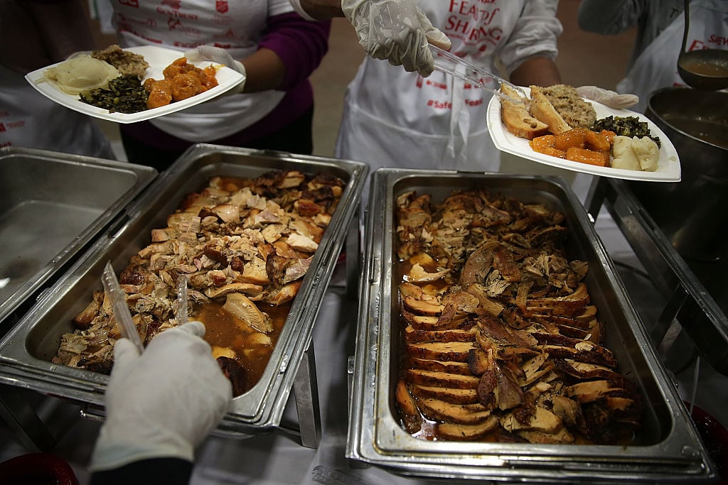 Volunteers serving thanksgiving day meals