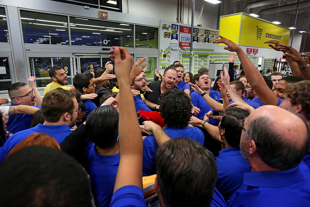 Best Buy employees do a group cheer before Black Friday Best Buy employees do a group cheer before Black Friday