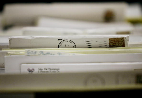 the tops of letters with postage on them the tops of letters with postage on them