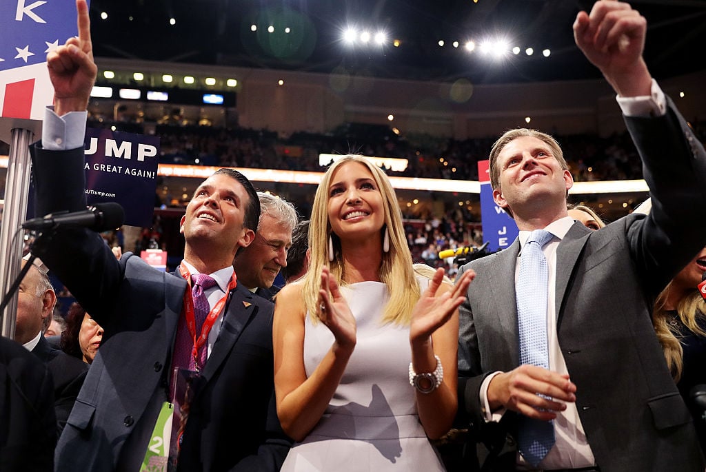 Trump Jr, Ivanka, and Eric Trump cheering on their father. Trump Jr, Ivanka, and Eric Trump cheering on their father.