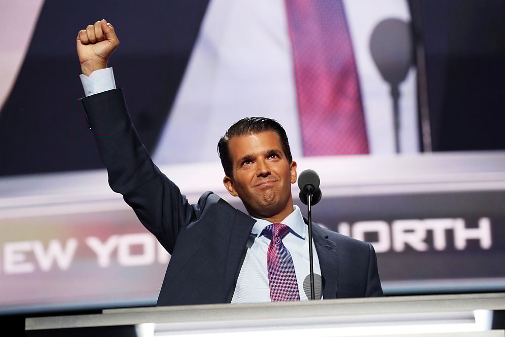 Donald Trump Jr. raising his fist in the air. Donald Trump Jr. raising his fist in the air.
