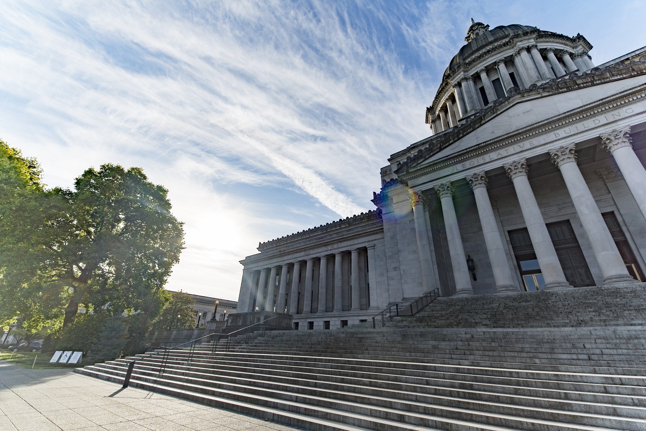 The Washington State Capitol building under a partly cloudy sky
