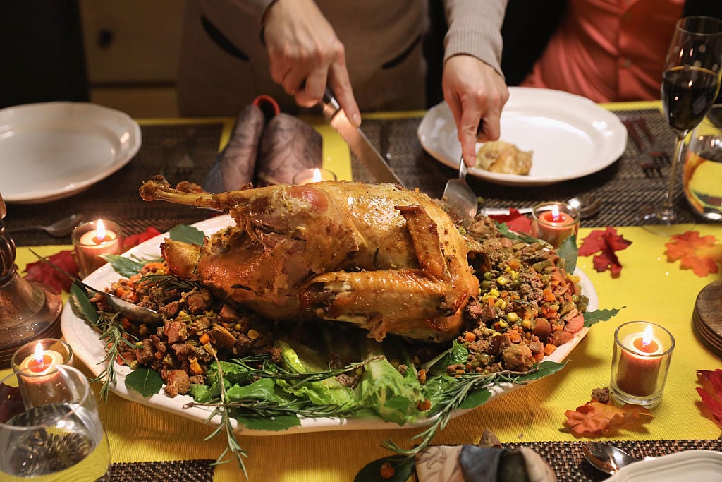 a thanksgiving turkey being carved