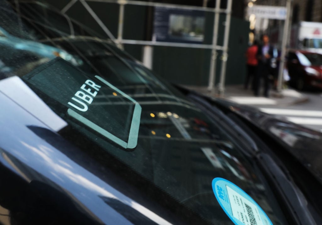 An Uber car waits for a client in Manhattan
