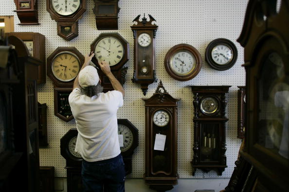 Man adjusts 20 clocks for daylight saving time Man adjusts 20 clocks for daylight saving time