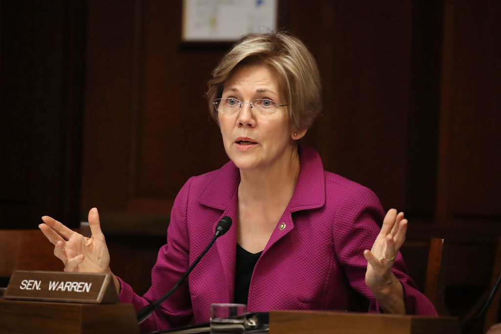 elizabeth warren in a maroon blazer in the senate elizabeth warren in a maroon blazer in the senate