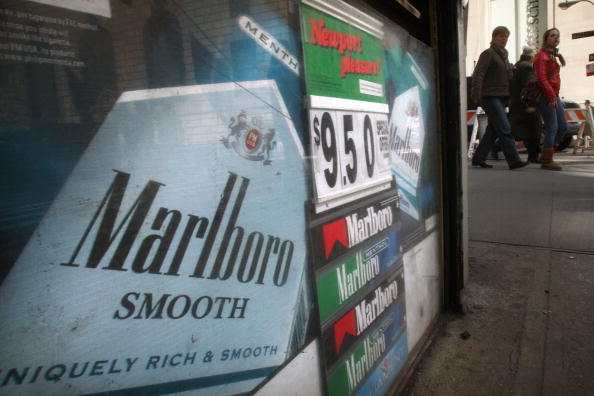 A kiosk advertising cigarettes A kiosk advertising cigarettes