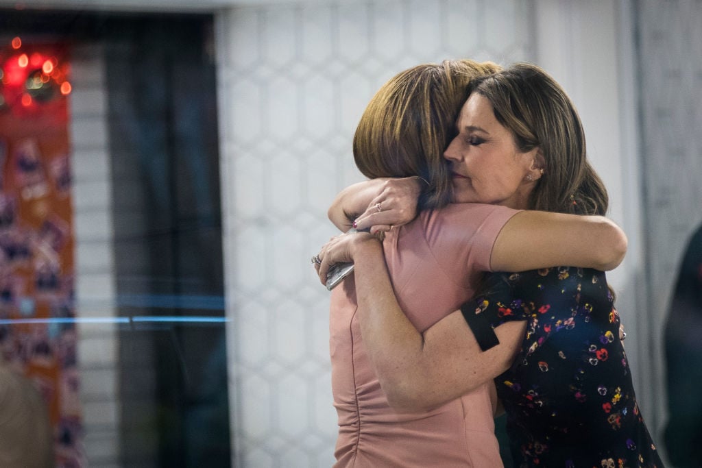 Hoda Kotb and Savannah Guthrie embrace at the end of the show on the set of NBC's Today Show. Today show hosts embrace after the first show without Lauer