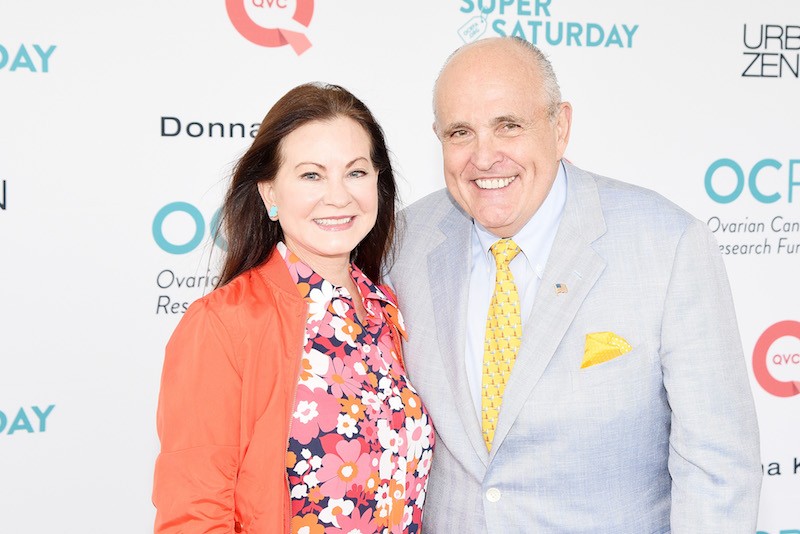Judith Nathan smiles while standing next to Mayor Giuliani. Judith Nathan smiles while standing next to Mayor Giuliani.