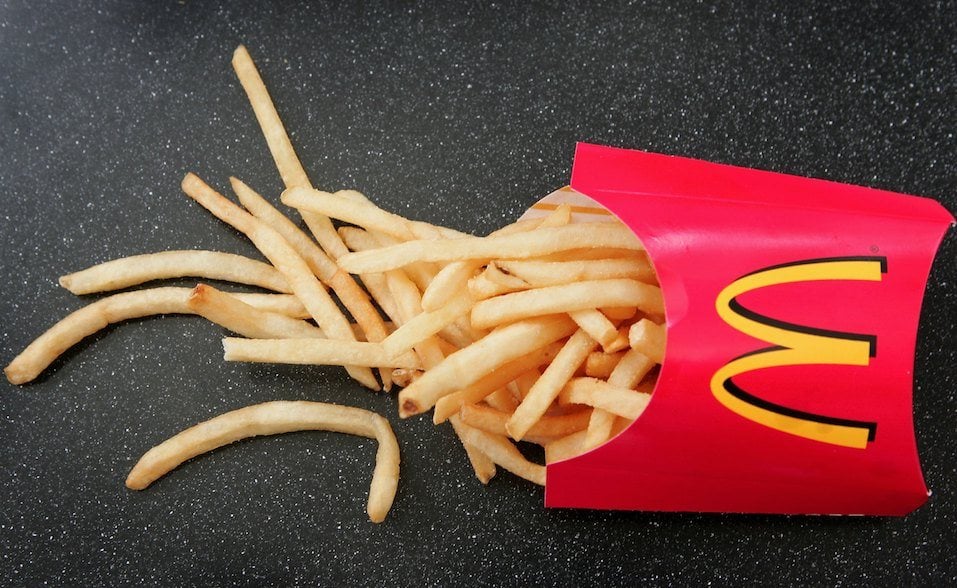French fries sit on a table at a McDonald's restaurant