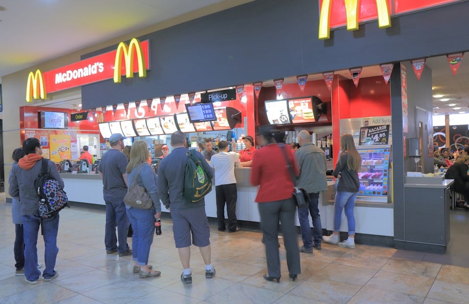 Customers line up at a McDonald's. 