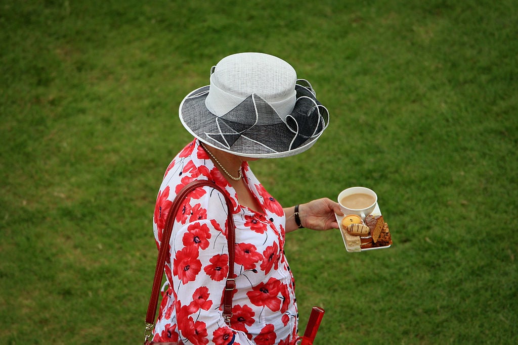 A woman holding tea