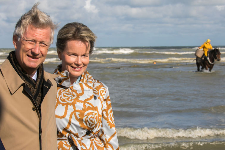 King Philippe of Belgium and Queen Mathilde of Belgium visit the horse mounted fishermen. King Philippe of Belgium and Queen Mathilde of Belgium visit the horse mounted fishermen.