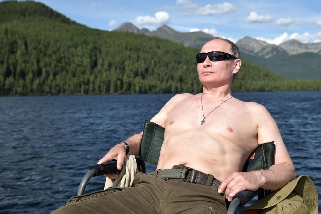 Russian President Vladimir Putin sunbathes during his vacation in the remote Tuva region