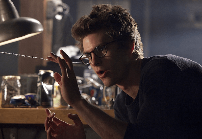 Peter inspecting a line of spiderweb. Peter inspecting a line of spiderweb.