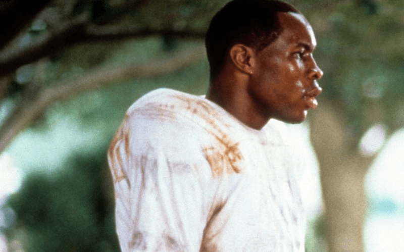 Julius Campbell standing on a football field. Julius Campbell standing on a football field.