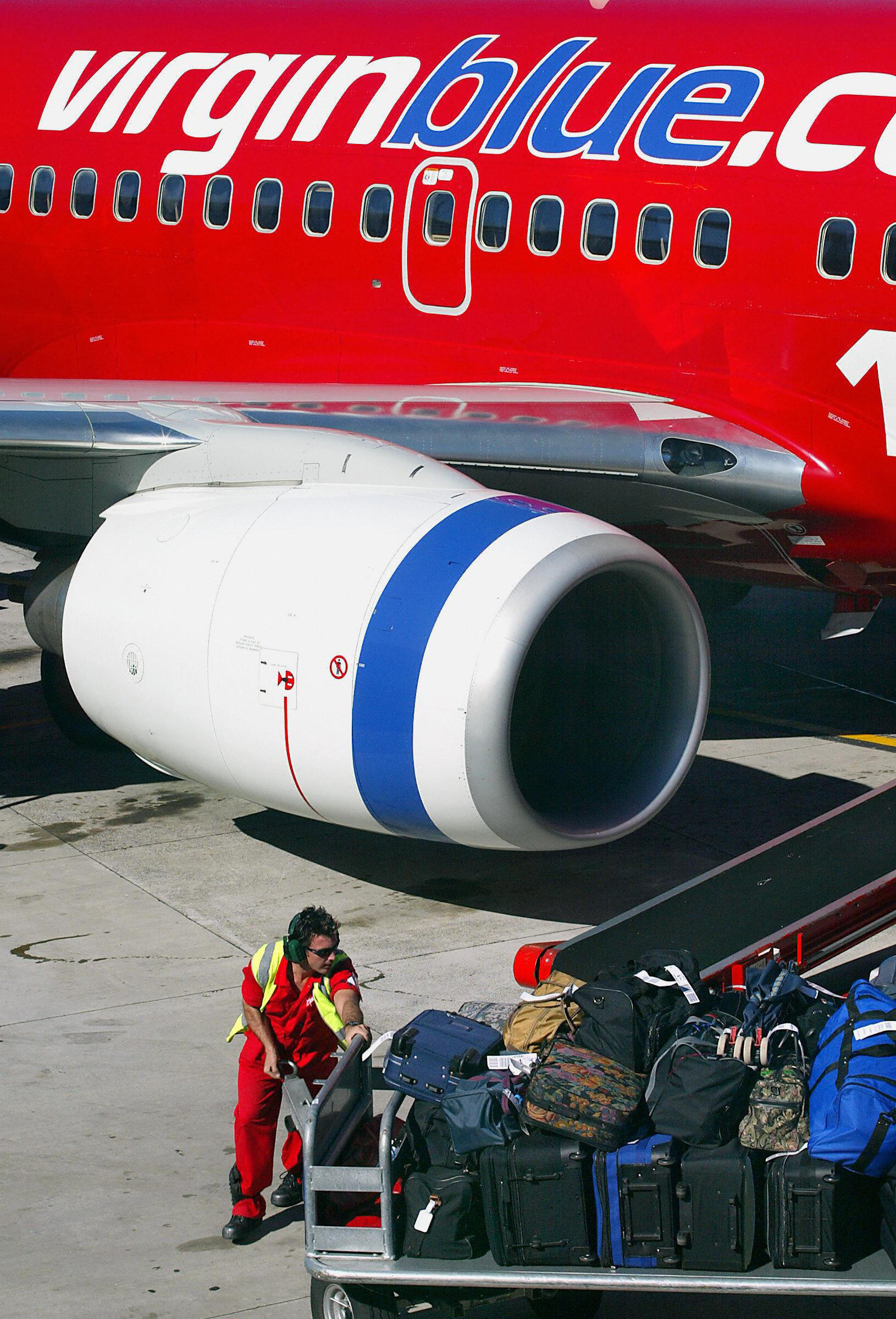 Baggage Handler loading luggage