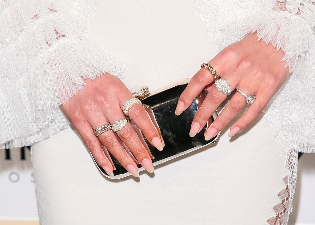 Chrissy Teigen nails and rings