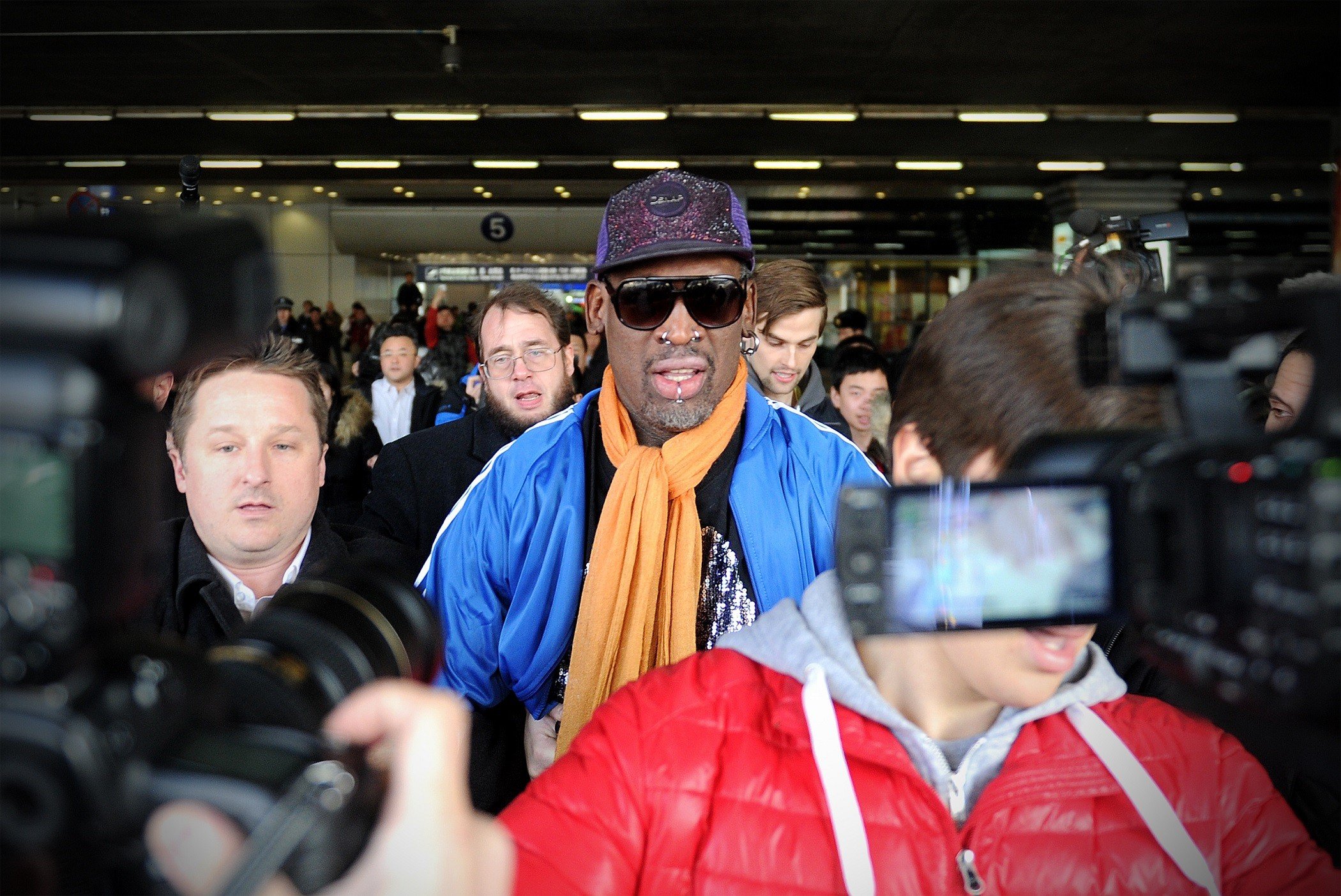Dennis Rodman leaving North Korea