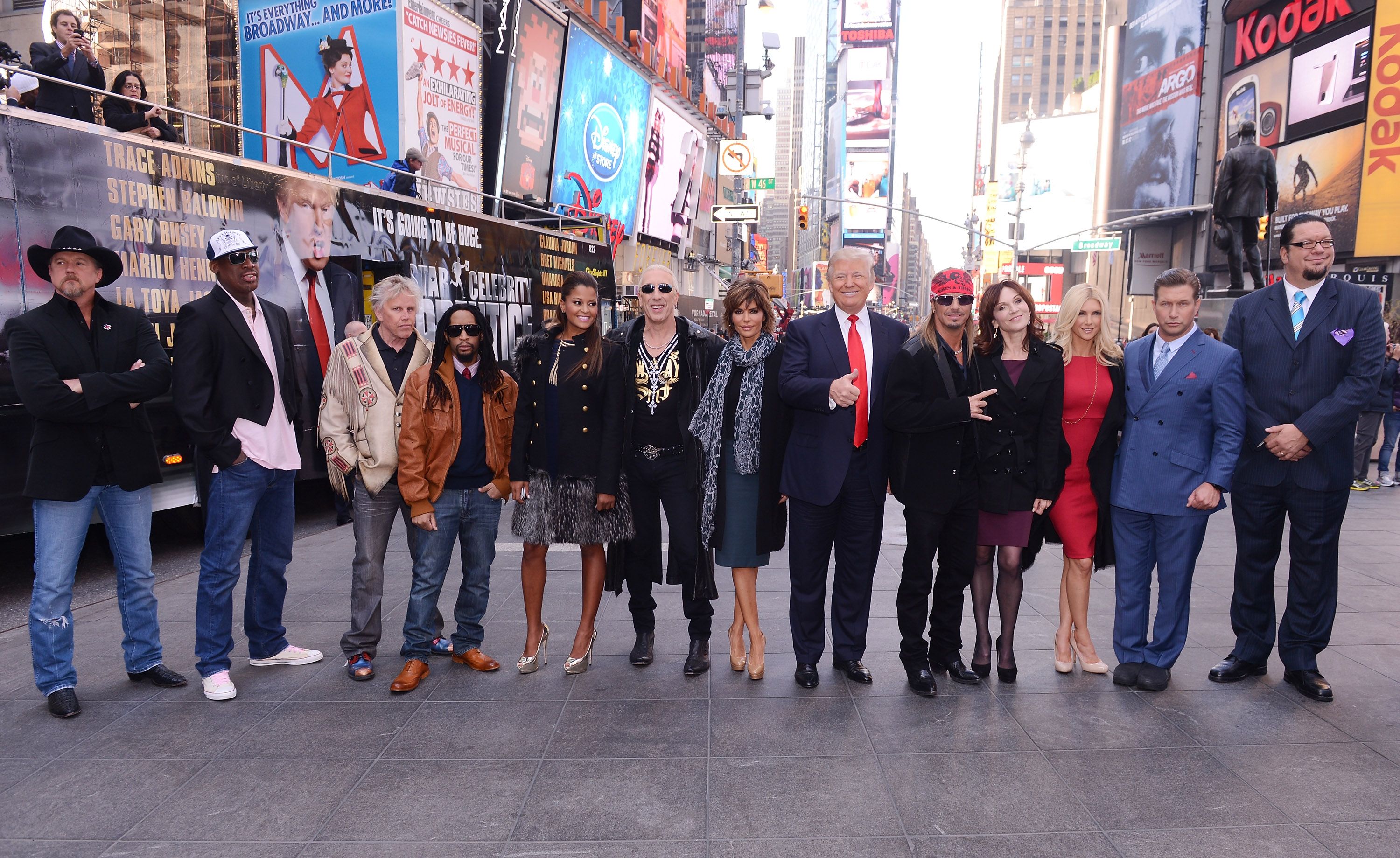 Castmembers Trace Adkins, Dennis Rodman, Garey Busey, Lil Jon, Claudia Jordan, Dee Snider, Lisa Renna, Donald Trump, Brett Michaels, Marilu Henner, Brande Roderick, Stephen Baldwin, and Penn Jillette attend the "Celebrity Apprentice All Stars" Season 13 Bus Tour at on October 12, 2012 in New York City. Celebrity Apprentice