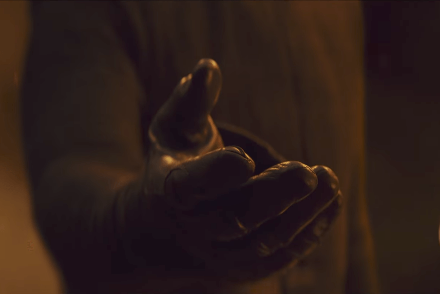 Kylo Ren extends his hand in Star Wars: The Last Jedi Kylo Ren extends his hand in Star Wars: The Last Jedi