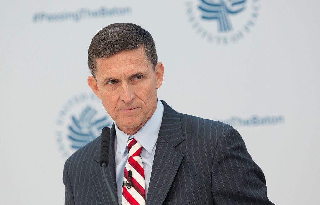Michael Flynn in a striped suit and tie Michael Flynn in a striped suit and tie