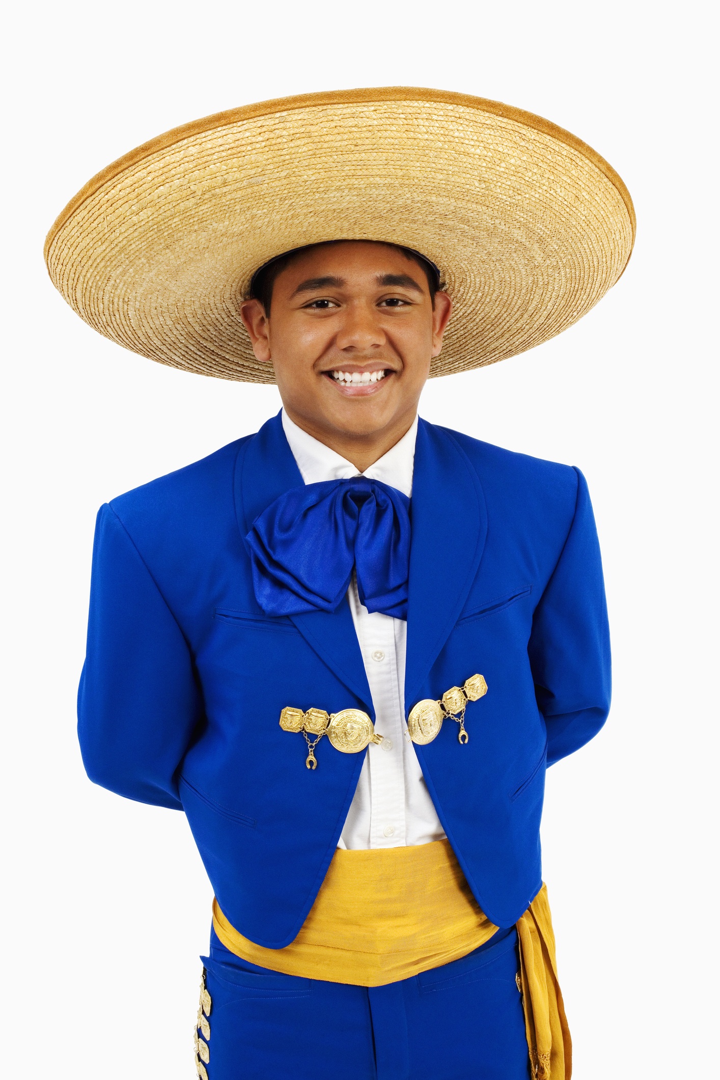 Young man in sombrero with hands behind back, portrait